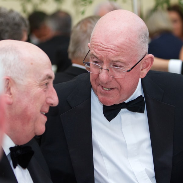 Justice Minister Charlie Flanagan shares a joke with Mr Justice Peter Kelly, President of the High Court style=