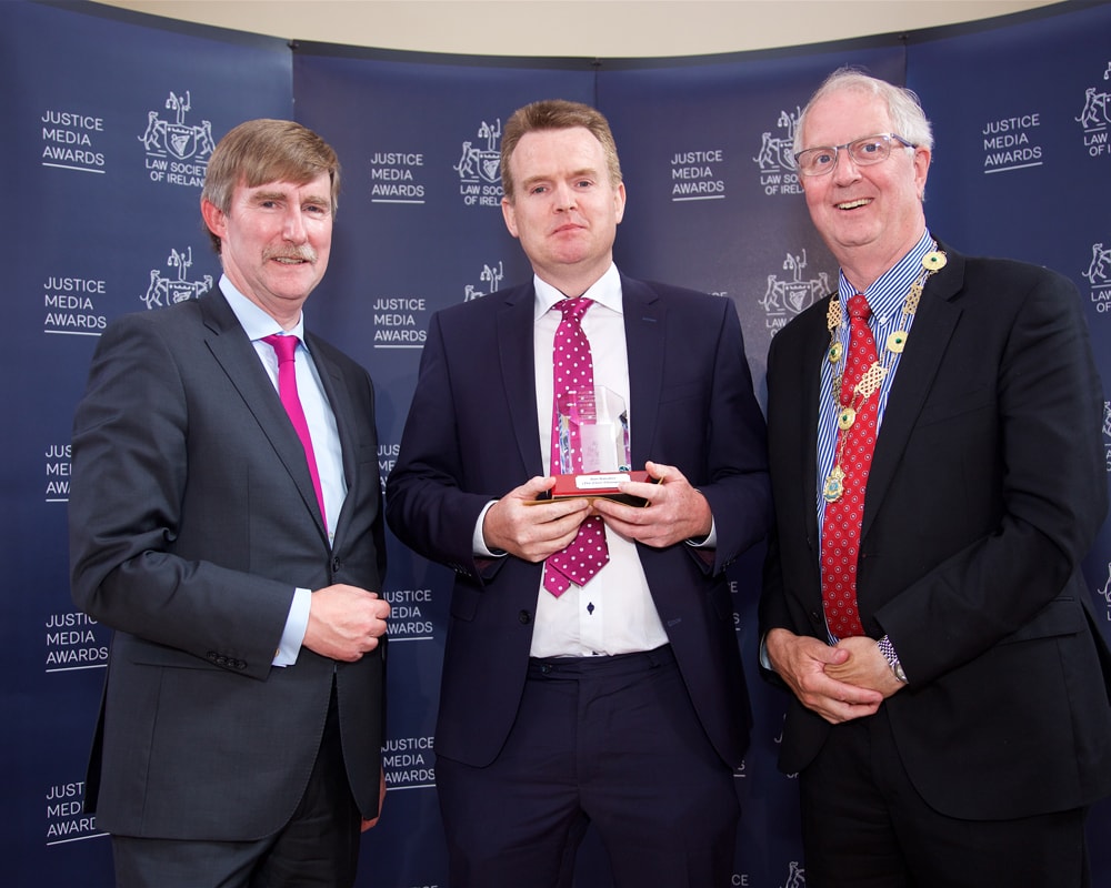 DG Ken Murphy and President Michael Quinlan with Dan Danaher of the Clare Champion style=