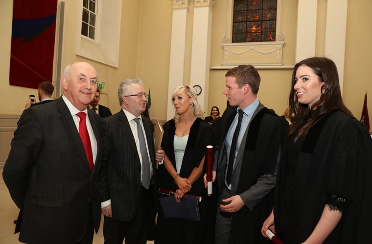 Mr Justice Peter Kelly and Attorney General Seamus Woulfe SC with newly-graduated solicitors Edel Murphy, Michael O'Neill and Maeve Griffin style=