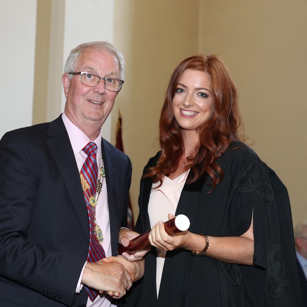 President Michael Quinlan with Ailbhe Durkin of MHC style=