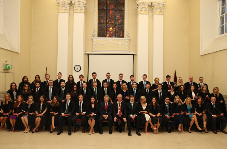 Mr Justice Michael White, Law Society President Michael Quinlan and Law Society Director General Ken Murphy with new solicitors in the Presidents’ Hall on 14 March, 2018 style=