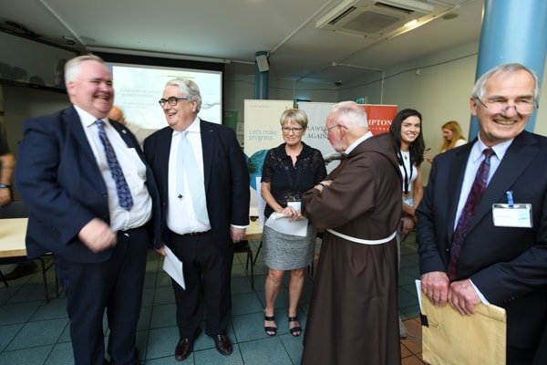 Lawyers Willie Penrose, Constance Cassidy and Ronnie Robbins with the Chief Justice style=