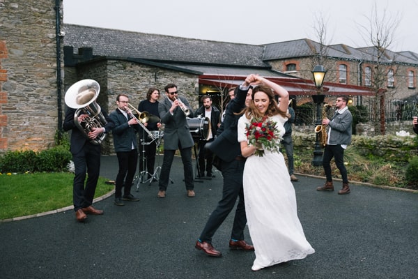 Stomptown Brass Band entertained guests at the reception style=