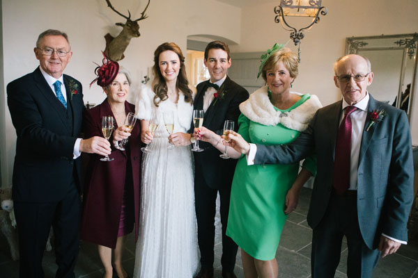 Proud parents Sean O'Rourke (far left) and Caroline Murphy (in green) and Mary and Maurice Ahern style=