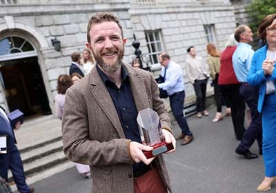 Sun journalist Michael Doyle takes top Law Society award style=