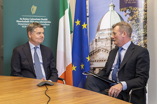 Law Society Director General Mark Garrett in conversation with Finance Minister Paschal Donohue style=